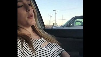 Hot blonde girl next door fingers herself in her car